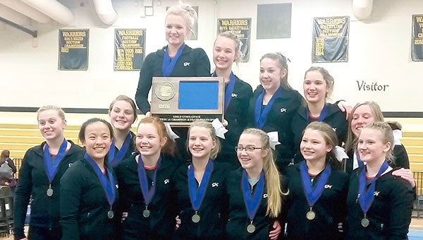 The Austin gymnastics team clinched its fourth straight trip to the Class A state meet in Caledonia Saturday.  Photo Provided