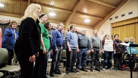 The Northwestern Singers rehearse for their upcoming winter show Monday night at Westminster Presbyterian Church. Eric Johnson/photodesk@austindailyherald.com