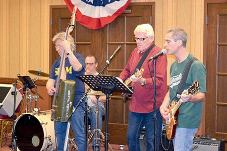 The Spare Parts band plays at the Hormel Historic Home Saturday during the Spam Kids Festival. 