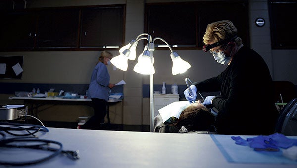 Operation Grace MN, a mobile dental service out of the Twin Cities, stopped for two days in Austin at the Salvation Army, utilizing local dental volunteers.  Eric Johnson/photodesk@austindailyherald.com