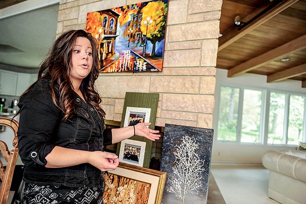 Danielle Jondal explains the process of some of her pieces which reflect from the many areas she draws influence from. Jondal was just one of the artists featured in the inaugural edition of Austin Expression.  Austin Living file photo