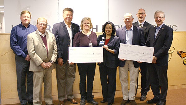 From left: Dale Wicks and Ted Hinrichs, Austin Rotary Club board members; Duane Feragen, Austin Rotary Club past president; Amy Baskin, Austin Rotary Club treasurer; Shayana De Silva, M.D., Mayo Clinic Health System pediatrician; Jerry McCarthy, Mayo Clinic Health System Austin Foundation president; Paul Baessler, Austin Rotary Club president; and Steve Thorson, Austin Rotary Club incoming president. Photo provided