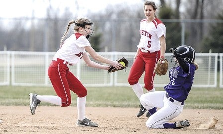 Austin shortstop Halie Retterath moves in to tag Red Wing’s Molly Goranson Tuesday evening at Todd Park. Eric johnson/photodesk@austindailyherald.com