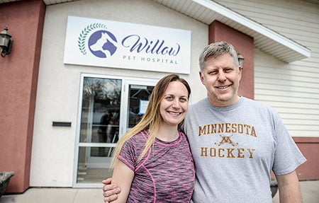 Mike and Sara Sasse stand outside Willow Pet Hospital Friday. The couple is set to open their new vet clinic soon.