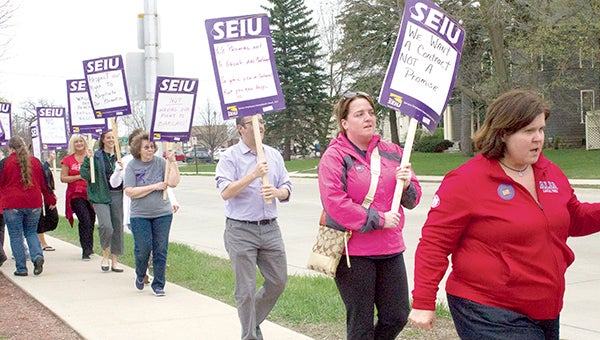 About three dozen union members and members of the public picketed outside Mayo Clinic Health System in Albert Lea to protest proposed contract language for the hospital’s unionized custodial engineers. -- Photo by Sam Wilmes/Albert Lea Tribune