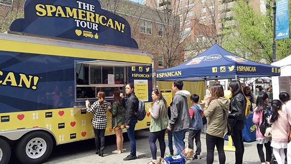 People line up for Spam Goodies from the Spamerican Tour, during the Tribeca Family Festival. Photos provided by Hormel