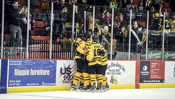 The Austin Bruins celebrate a goal from this past weekend where they wrapped up a first-round series with Minot. They move to the NAHL Central Division Championship starting this weekend in Bismarck. Photos by Eric Johnson/photodesk@austindailyherald.com