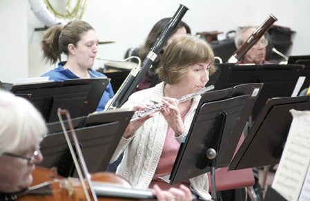 Gayle Heimer, principal flutist, rehearses with the Austin Symphony Orchestra, which will perform Ópera Festiva! from 2 to 4 p.m. on April 17 at the Historic Paramount Theatre. Jason Schoonover/jason.schoonover@austindailyherald.com