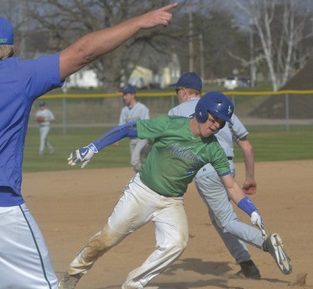 Daniel Bollingberg rounds third base for Lyle-Pacelli in Marcusen Park Friday. Rocky Hulne/sports@austindailyherald.com