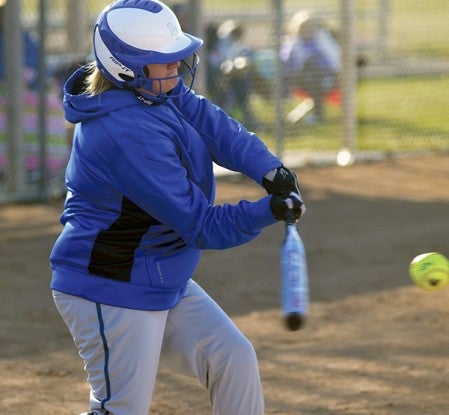 Abby Prescott takes a swing for the Lyle-Pacelli softball team against GMLOK Monday. Rocky Hulne/sports@austindailyherald.com