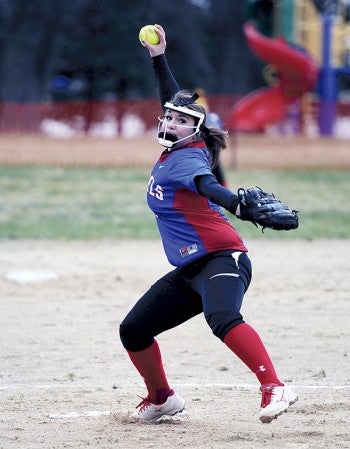 Southland’s Kayla Swenson goes through her pitching rotation against Dover-Eyota in Rose Creek Thursday. Rocky Hulne/sports@austindailyherald.com
