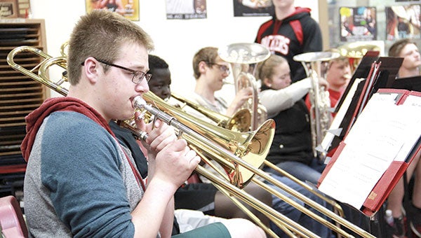 Trombonist Max Reynen rehearses with the Symphonic Band in Austin High School on Monday. The band program is preparing for the annual Band Blast to close the season at 7 p.m. on May 20 in Knowlton Auditorium. Jason Schoonover/jason.schoonover@austindailyherald.com