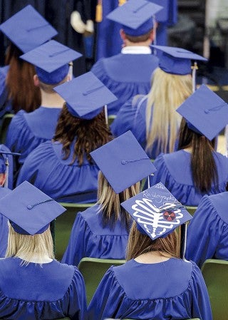 A graduate from the radiography program displays it on her cap during Riverland Community College’s commencement Friday. Eric Johnson/photodesk@austindailyherald.com