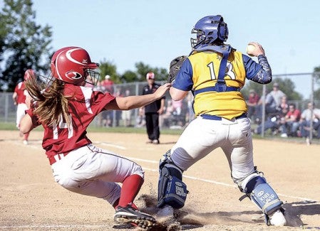 Hayfield’s Grace Mindrup looks to third after getting the force out on Wabasha-Kellogg’s Kada Malakowsky in the Section 1A championship Thursday at Todd Park. Eric Johnson/photodesk@austindailyherald.com
