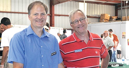 Republicans Gene Dornink and Dennis Schminke pose at the Austin Chamber of Commerce annual pork chop feed Tuesday night at the Mower County Fairgrounds. Schminke is running for House District 27B seat and Dornink is running for state Senate in District 27.