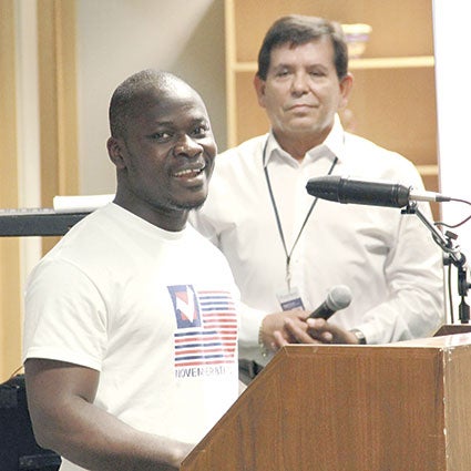 Riverland Community College Student Senate President Adama Youhn talks about his story moving to Austin from Liberia during a program called “Immigrant Stories,” which was part of Austin’s first Welcoming Week.  Jason Schoonover/ jason.schoonover@ austindailyherald.com