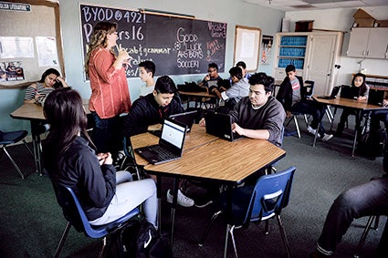 Sophomores in the English Arts class get their laptops out to begin looking at an upcoming project.  EricJohnson/photodesk@austindailyherald.com