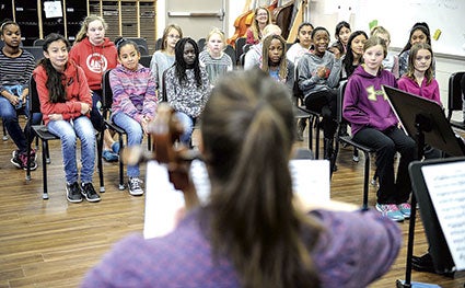  I.J. Holton Intermediate School students listen to the quartet. 