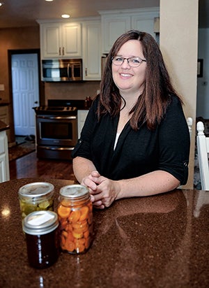 Patty Conradt and her family have made canning an intricate part of their life allowing them to live a health-conscious life. Eric Johnson/photodesk@austindailyherald.com