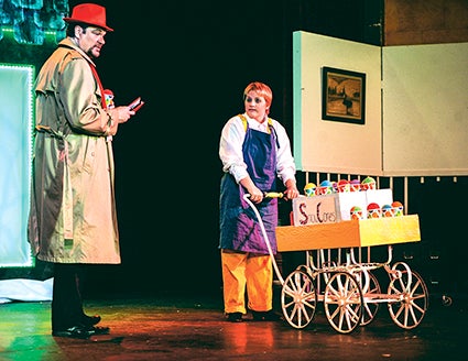The detective Red Mistletoe (Randy Forster) questions Fruitcake (Blythe Johnson) during a performance of The Matchbox Children’s Theatre presentation of “Justin in the Nick of Time,” Thursday afternoon at The Paramount Theatre. 