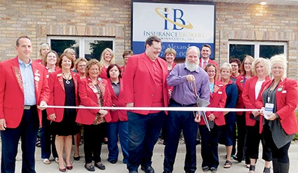 NEW MEMBER. Ambassadors held a ribbon-cutting ceremony with Wyn Alexander, agent for Insurance Brokers of Minnesota, in front of his office at 909 12th Street SW. Insurance Brokers offers financial investments and insurance for commercial, farm and personal customers. Pictured alongside Alexander, center, is Sales Associate Dave Applen, who also serves as a Chamber Ambassador. Photo provide