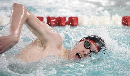 Ethan Thompson swims in the 200 freestyle during a dual against Albert Lea Thursday night at Bud Higgins Pool. Eric Johnson/photodesk@austindailyherald.com