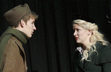 John, played by Peter Torkelson, left and Lizzy Wolterman say goodbye as John heads to the Battle of the Bulge. Deb Nicklay/deb.nicklay@austindailybherald.com