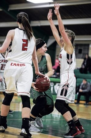 Lyle-Pacelli’s Lucy Nelson works underneath in the first half against LeRoy-Ostrander Tuesday night in Pacelli. Eric Johnson/photodesk@austindailyherald.com