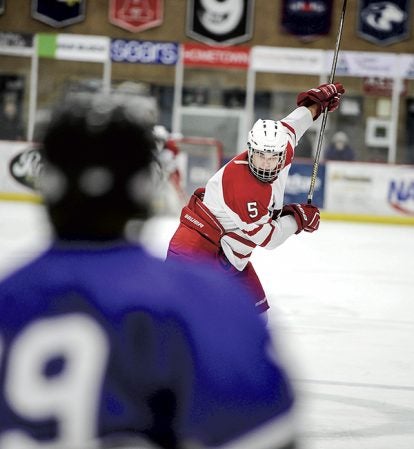 Austin’s AJ Mueller winds up for a shot in the second period against Red Wing Thursday night in Riverside Arena. Eric Johnson/photodesk@austindailyherald.com