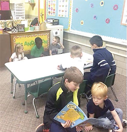 The fourth grade and Tiny Shamrock preschool reading buddies. Pictured in the back row from left are: Layla Wollenberg, Yong Achuoth, Aiden Uher; in the middle row from left: Knox Heimer, Diego Nieto Sorela; and in the front from left: Daran Plunkett and Logan Schafer. Photo provided