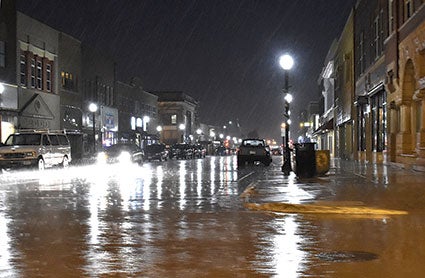 Thunderstorms drop heavy rains on downtown Austin Monday shortly after 6 p.m. The system brought heavy rains, blustery winds and some small hail to the Austin area. However, parts of Clarks Grove were blocked off due to storm damage. Jason Schoonover/jason.schoonover@austindailyherald.com