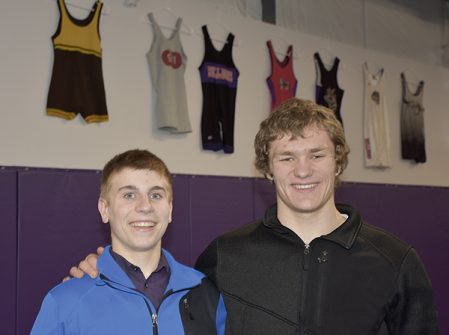 While Jackson Hale, left, is just getting started on the state wrestling scene, Christophor Bain recently won the first ever state wrestling title by a Grand Meadow wrestler. Rocky Hulne/sports@austindailyherald.com
