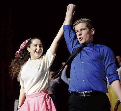 Brock Lawhead and Lila Parada perform during rehearsal.